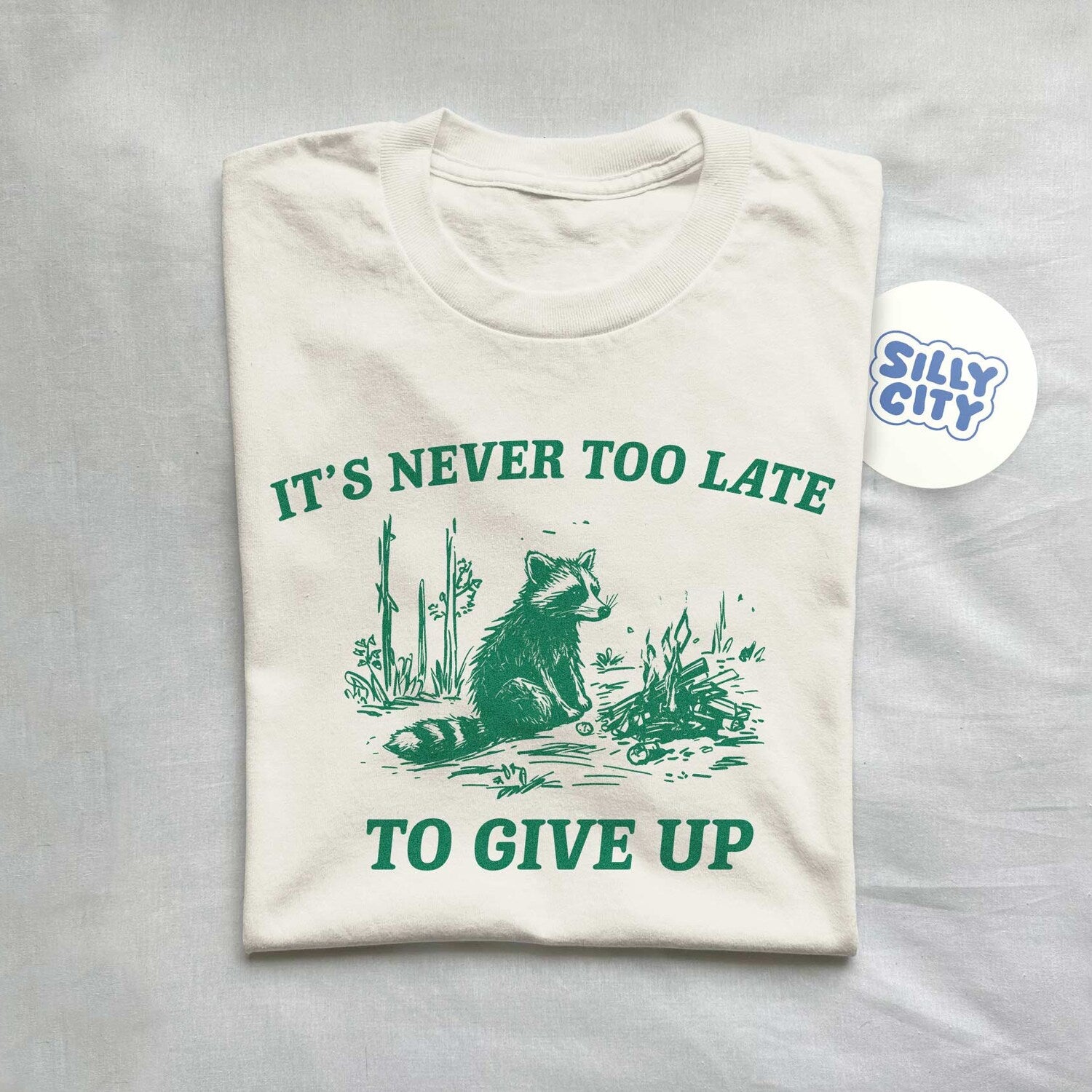 'It's Never Too Late To Give Up' Raccoon Tee - Sarcastic Vintage Graphic Novelty Shirt